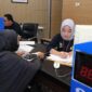 Masyarakat tengah mendapatkan Layanan Hak Tanggungan.