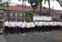 Upacara pengambilan sumpah janji panitia ajudikasi dalam program PTSL.