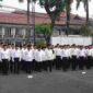 Upacara pengambilan sumpah janji panitia ajudikasi dalam program PTSL.