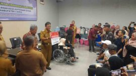 Pemberian bantuan untuk disabilitas.